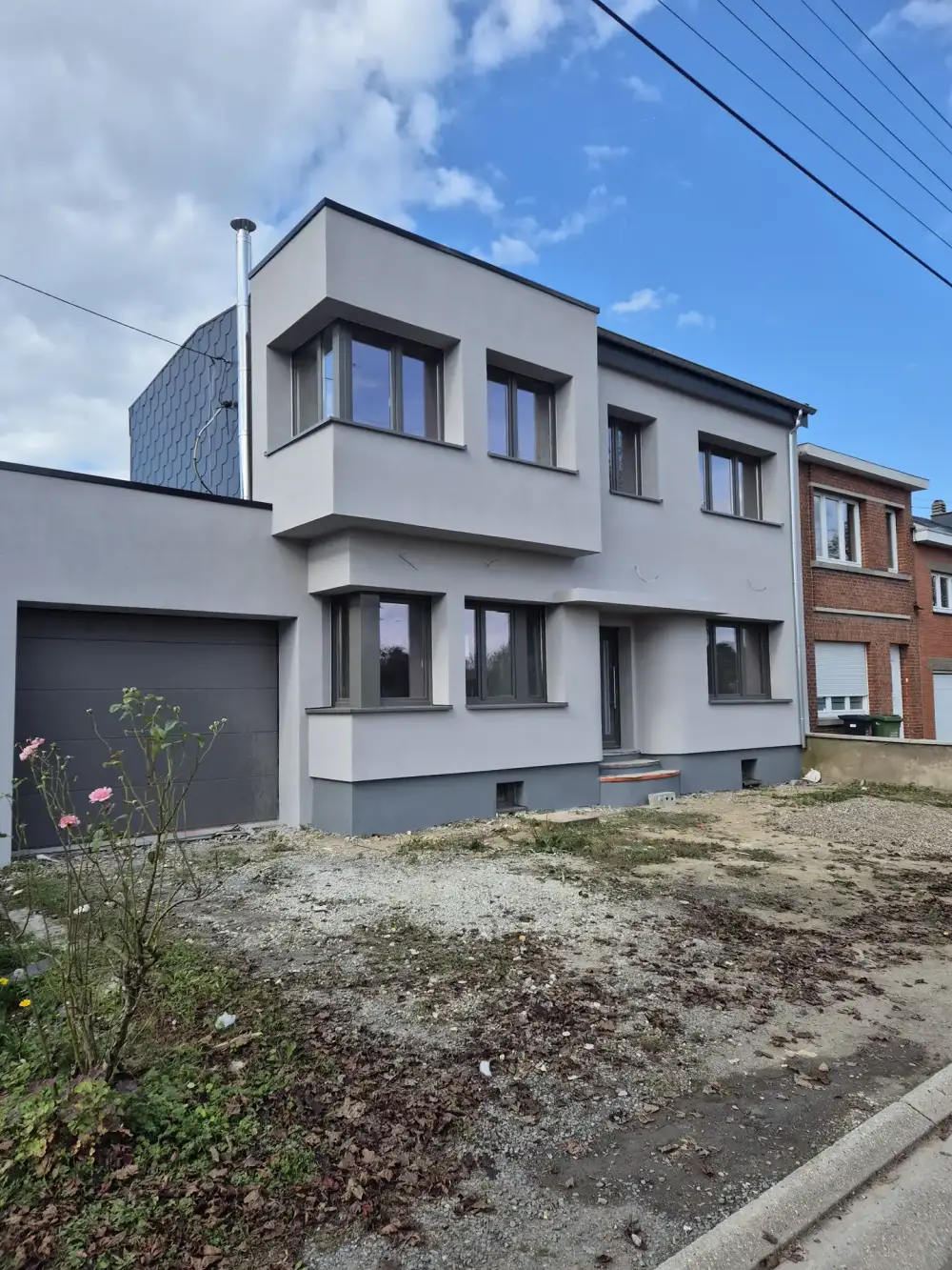 Travaux de façade et enduit extérieur par entreprise de construction à Fléron